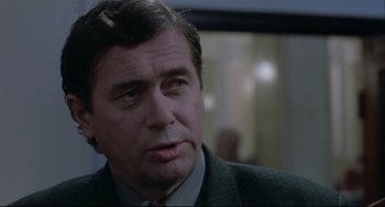 Movie still from “Three Colors: White” (1994), directed by Krzysztof Kieslowski – Close Up shot, Over the shoulder angle