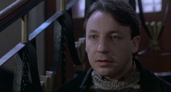 Movie still from “Three Colors: White” (1994), directed by Krzysztof Kieslowski – Close Up shot, Low angle