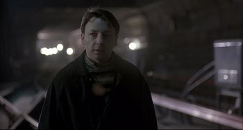 Movie still from “Three Colors: White” (1994), directed by Krzysztof Kieslowski – Close Up shot, Low angle