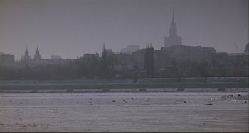 Movie still from “Three Colors: White” (1994), directed by Krzysztof Kieslowski – Extreme Wide shot, Low angle