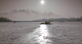 Movie still from “Three Colors: White” (1994), directed by Krzysztof Kieslowski – Extreme Wide shot, Low angle