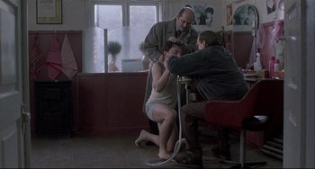 Movie still from “Three Colors: White” (1994), directed by Krzysztof Kieslowski – Wide shot, Over the shoulder angle