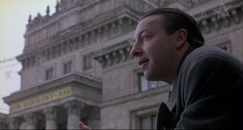 Movie still from “Three Colors: White” (1994), directed by Krzysztof Kieslowski – Close Up shot, Low angle