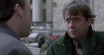 Movie still from “Three Colors: White” (1994), directed by Krzysztof Kieslowski – Close Up shot, Over the shoulder angle