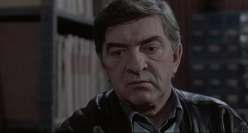 Movie still from “Three Colors: White” (1994), directed by Krzysztof Kieslowski – Close Up shot, Over the shoulder angle