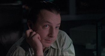 Movie still from “Three Colors: White” (1994), directed by Krzysztof Kieslowski – Close Up shot, Low angle