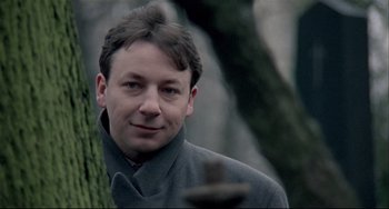 Movie still from “Three Colors: White” (1994), directed by Krzysztof Kieslowski – Close Up shot, Over the shoulder angle