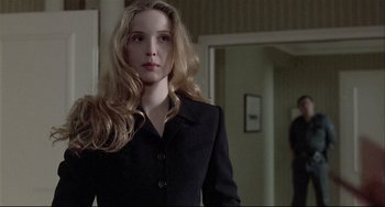 Movie still from “Three Colors: White” (1994), directed by Krzysztof Kieslowski – Close Up shot, Over the shoulder angle