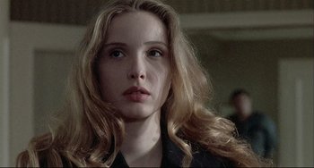 Movie still from “Three Colors: White” (1994), directed by Krzysztof Kieslowski – Close Up shot, Low angle