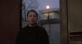 Movie still from “Three Colors: White” (1994), directed by Krzysztof Kieslowski – Close Up shot, Low angle