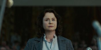 Movie still from “Chernobyl” (2019), directed by Johan Renck – A woman in a jacket looking to her left; Close Up shot, Low angle