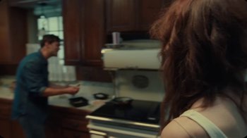 Movie still from “The Rolling Stones - Mess It Up” (2024), directed by Calmatic – Close Up shot, Over the shoulder angle