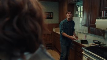 Movie still from “The Rolling Stones - Mess It Up” (2024), directed by Calmatic – Medium shot, Over the shoulder angle