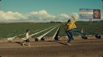 Movie still from “The Rolling Stones - Mess It Up” (2024), directed by Calmatic – Extreme Wide shot, Low angle