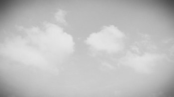 Movie still from “Sampha - Can’t Go Back” (2023), directed by Saad Moosajee – Extreme Wide shot, Low angle