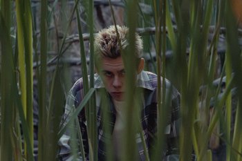 Movie still from “The Kid Laroi - Bleed” (2023), directed by Ramez Silyan – Medium shot, High angle