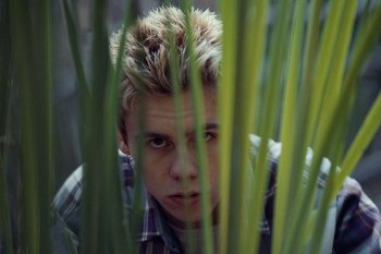 Movie still from “The Kid Laroi - Bleed” (2023), directed by Ramez Silyan – Extreme Close Up shot, High angle