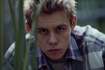 Movie still from “The Kid Laroi - Bleed” (2023), directed by Ramez Silyan – Close Up shot, Low angle