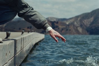 Movie still from “The Kid Laroi - Bleed” (2023), directed by Ramez Silyan – Extreme Close Up shot, High angle