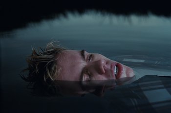 Movie still from “The Kid Laroi - Bleed” (2023), directed by Ramez Silyan – Medium shot, Overhead angle