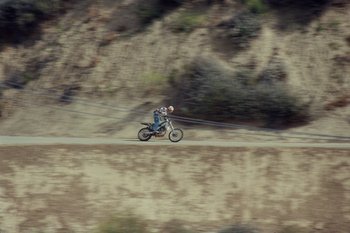 Movie still from “The Kid Laroi - Bleed” (2023), directed by Ramez Silyan – Extreme Wide shot, High angle