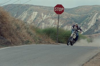 Movie still from “The Kid Laroi - Bleed” (2023), directed by Ramez Silyan – Wide shot, Low angle