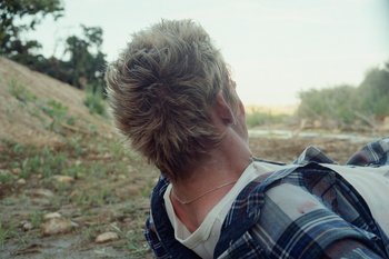 Movie still from “The Kid Laroi - Bleed” (2023), directed by Ramez Silyan – Close Up shot, Over the shoulder angle