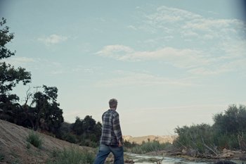 Movie still from “The Kid Laroi - Bleed” (2023), directed by Ramez Silyan – Wide shot, Low angle