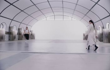 Movie still from “Björk, Rosalía - Oral” (2023), directed by Carlota Guerrero – Wide shot, Low angle