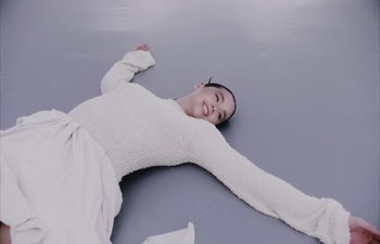 Movie still from “Björk, Rosalía - Oral” (2023), directed by Carlota Guerrero – Medium shot, High angle