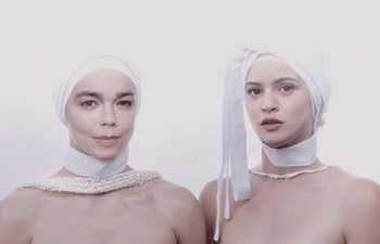 Movie still from “Björk, Rosalía - Oral” (2023), directed by Carlota Guerrero – Close Up shot, Low angle