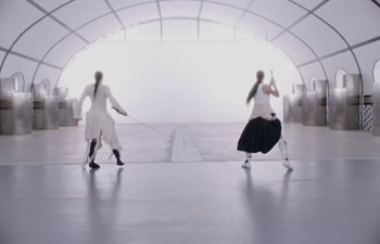 Movie still from “Björk, Rosalía - Oral” (2023), directed by Carlota Guerrero – Wide shot, Low angle