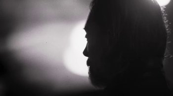 Movie still from “The Smile - Wall Of Eyes” (2023), directed by Paul Thomas Anderson – Extreme Close Up shot, Low angle