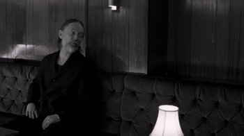 Movie still from “The Smile - Wall Of Eyes” (2023), directed by Paul Thomas Anderson – Medium shot, Low angle