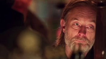 Movie still from “The Smile - Wall Of Eyes” (2023), directed by Paul Thomas Anderson – Close Up shot, Over the shoulder angle