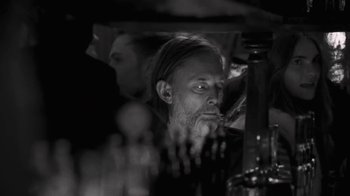Movie still from “The Smile - Wall Of Eyes” (2023), directed by Paul Thomas Anderson – Close Up shot, Over the shoulder angle