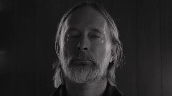 Movie still from “The Smile - Wall Of Eyes” (2023), directed by Paul Thomas Anderson – Close Up shot, Low angle