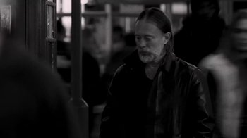 Movie still from “The Smile - Wall Of Eyes” (2023), directed by Paul Thomas Anderson – Medium shot, Low angle