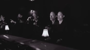 Movie still from “The Smile - Wall Of Eyes” (2023), directed by Paul Thomas Anderson – Medium shot, High angle