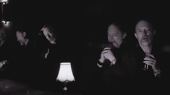 Movie still from “The Smile - Wall Of Eyes” (2023), directed by Paul Thomas Anderson – Medium shot, Low angle