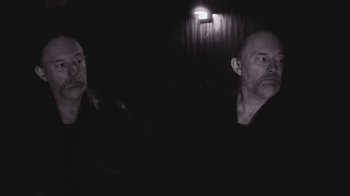 Movie still from “The Smile - Wall Of Eyes” (2023), directed by Paul Thomas Anderson – Close Up shot, Low angle