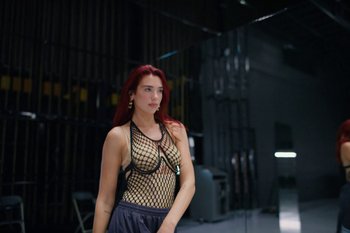 Movie still from “Dua Lipa - Houdini” (2023), directed by Manu Cossu – Medium shot, Low angle