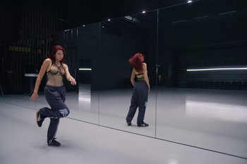 Movie still from “Dua Lipa - Houdini” (2023), directed by Manu Cossu – Wide shot, High angle