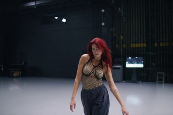 Movie still from “Dua Lipa - Houdini” (2023), directed by Manu Cossu – Medium shot, Low angle
