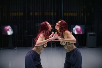 Movie still from “Dua Lipa - Houdini” (2023), directed by Manu Cossu – Medium shot, Overhead angle