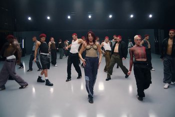 Movie still from “Dua Lipa - Houdini” (2023), directed by Manu Cossu – Wide shot, Low angle