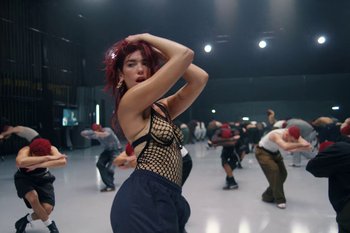 Movie still from “Dua Lipa - Houdini” (2023), directed by Manu Cossu – Medium shot, Low angle