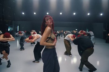 Movie still from “Dua Lipa - Houdini” (2023), directed by Manu Cossu – Wide shot, Low angle