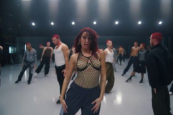 Movie still from “Dua Lipa - Houdini” (2023), directed by Manu Cossu – Medium shot, High angle