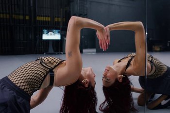 Movie still from “Dua Lipa - Houdini” (2023), directed by Manu Cossu – Medium shot, Overhead angle